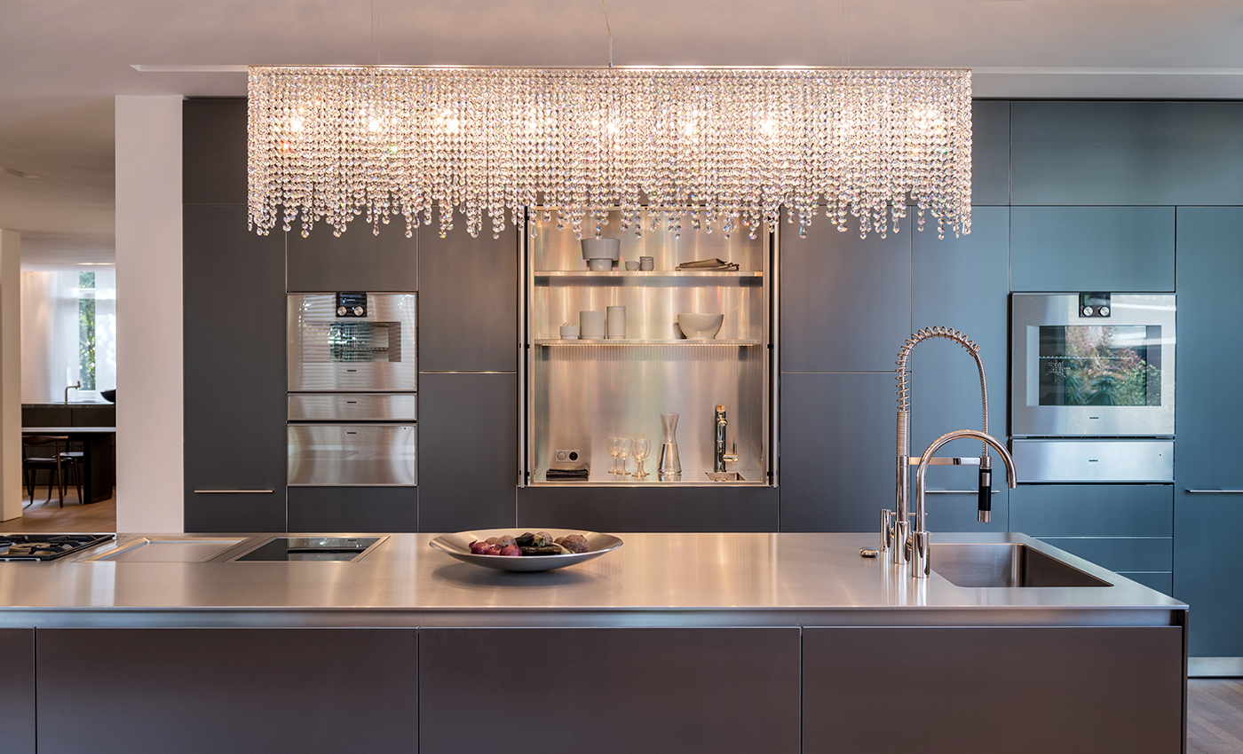 Manooi's Linea hangs over a kitchen island in the Bulthaup showroom in Cologne. 