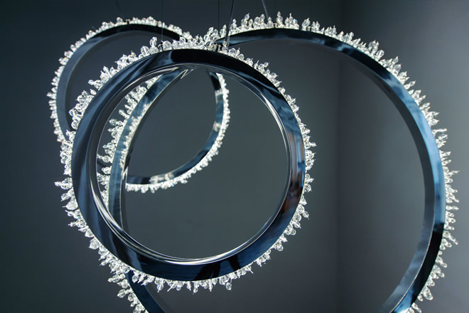 Vertical crystal chandelier, the Halo from Manooi in a cluster.